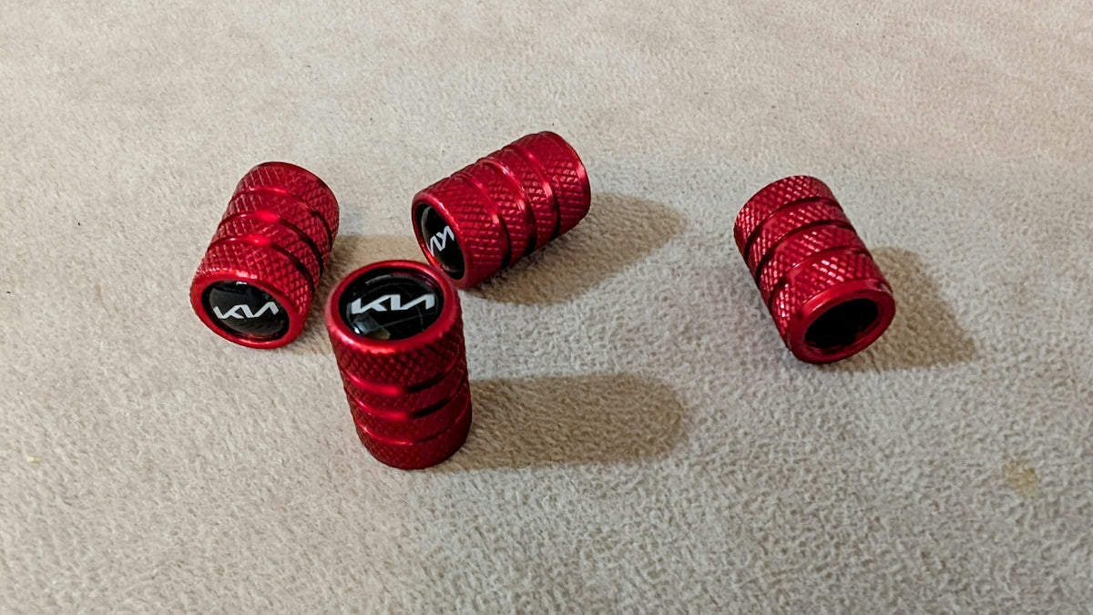 A group of red grips sitting on top of a carpet